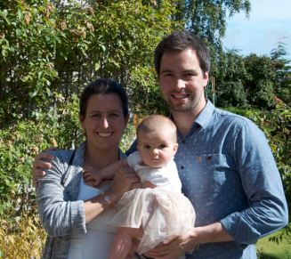 A nice family portrait spoiled because of shadows across the faces.